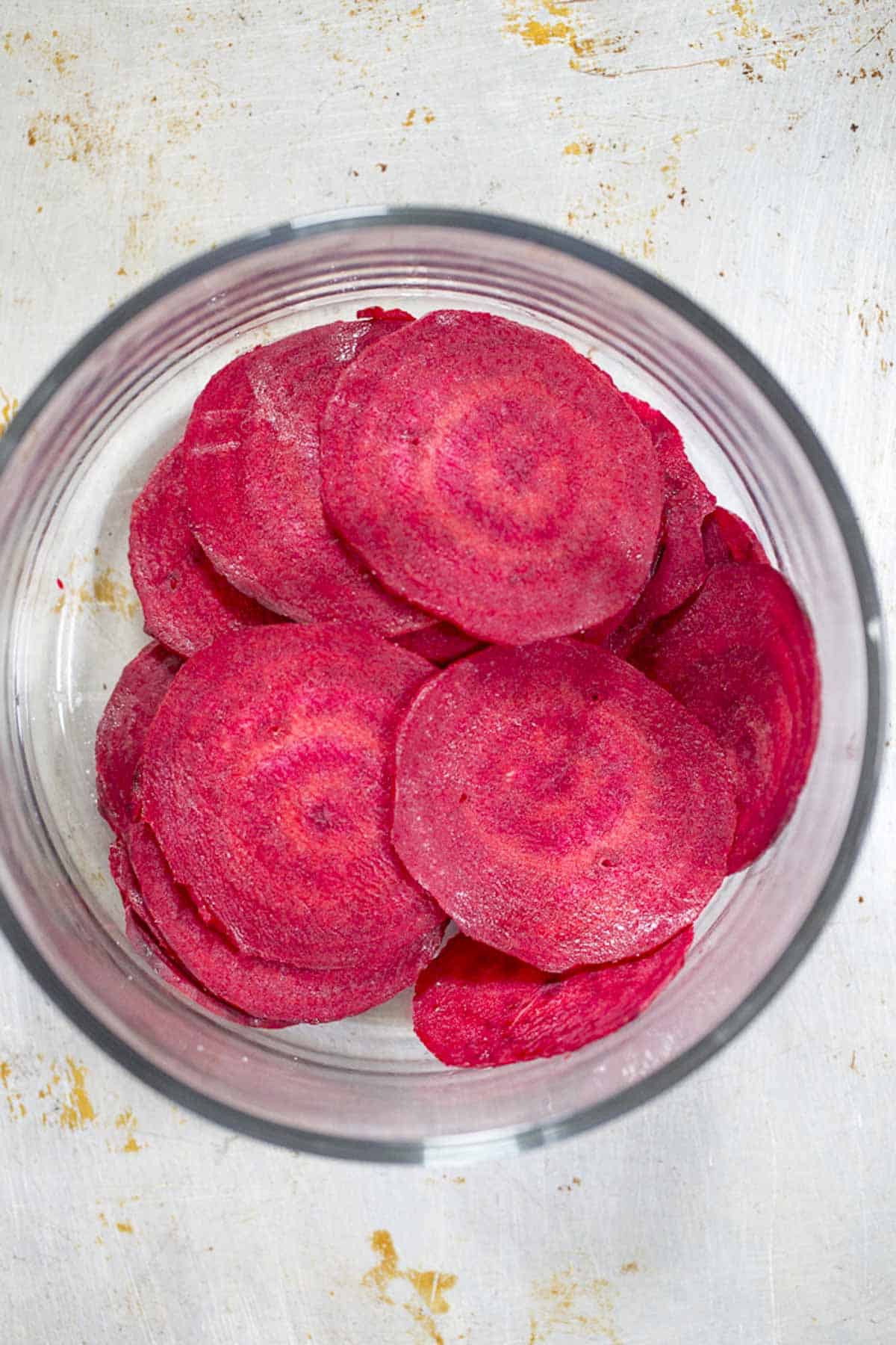 toss beet slices with oil and salt.