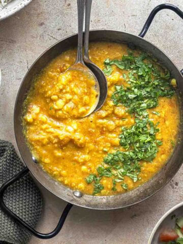 dal fry served with rice and kachumber salad