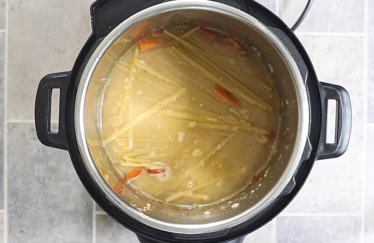 Add water over noodles in Instant Pot.