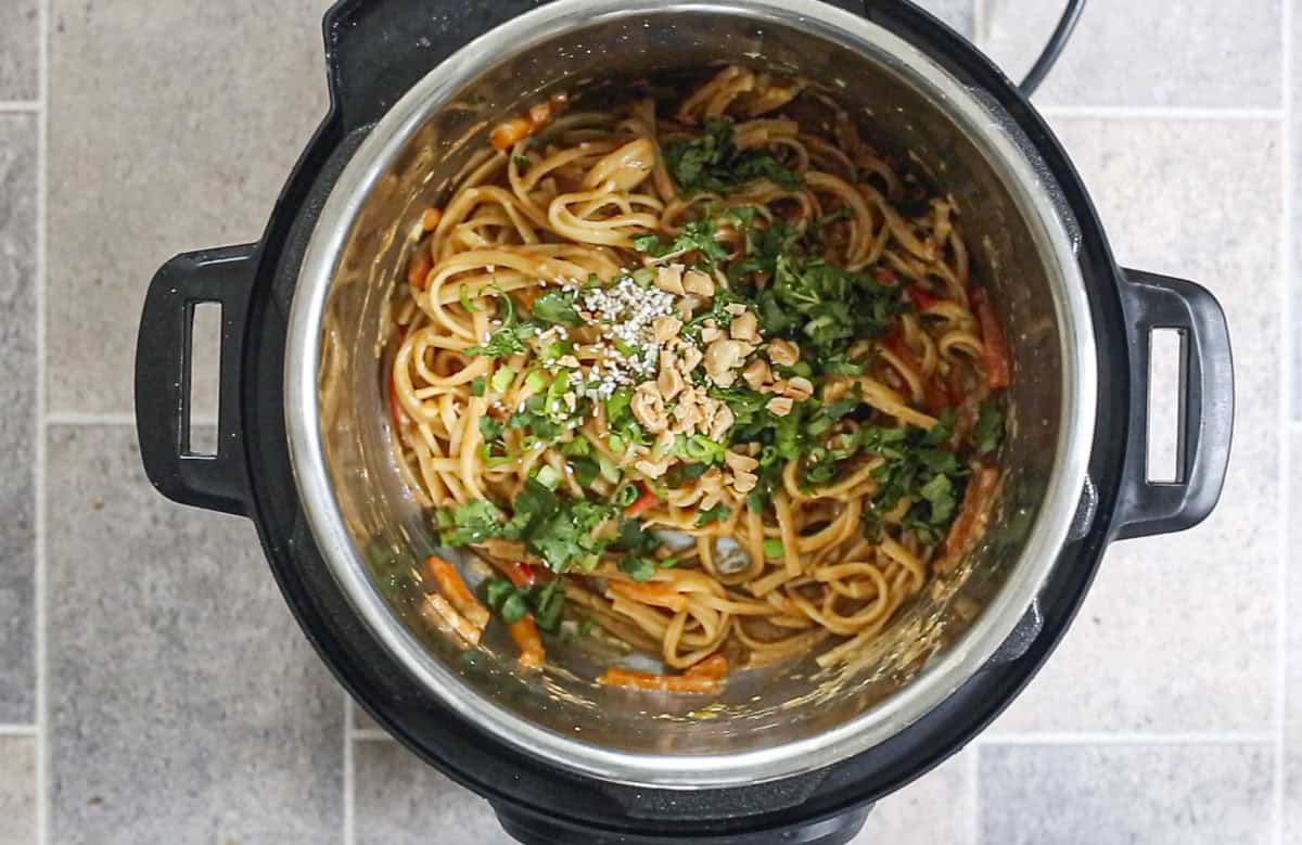 add garnishes over the Thai Peanut Noodles in Instant Pot.