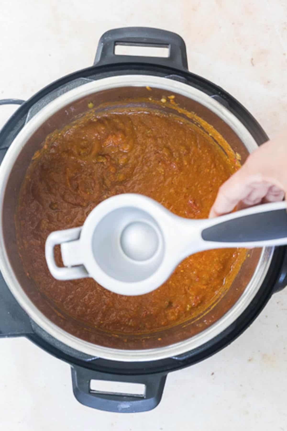 add lemon juice to the mashed pav bhaji