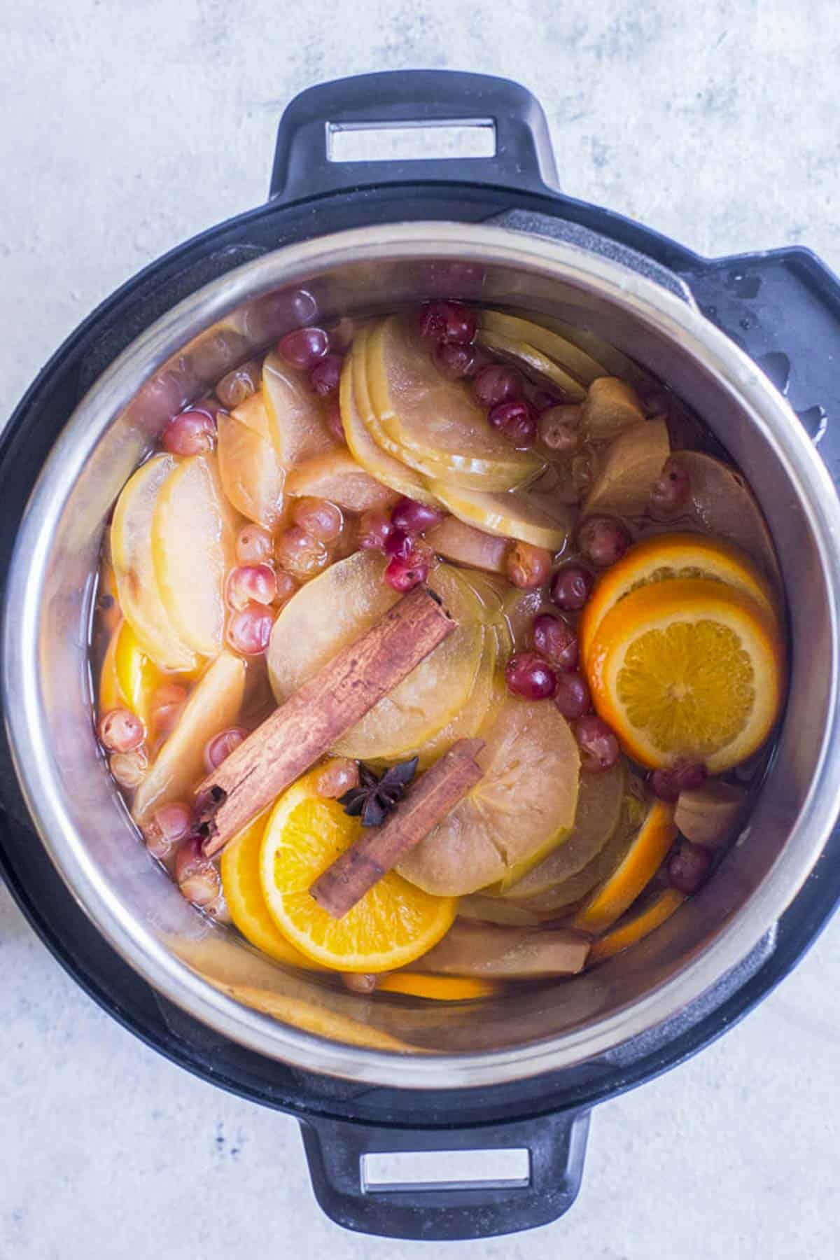 pressure cooked apple, oranges, cranberries and spices in the inner pot of instant pot.