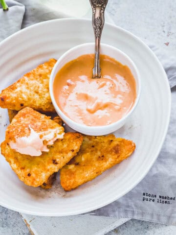 hash browns served with mayonnaise based boom boom sauce.