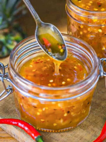 a small jar of vegan pineapple sweet chilli sauce.