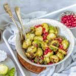 air fryer roasted brussels sprouts served with pomegranate