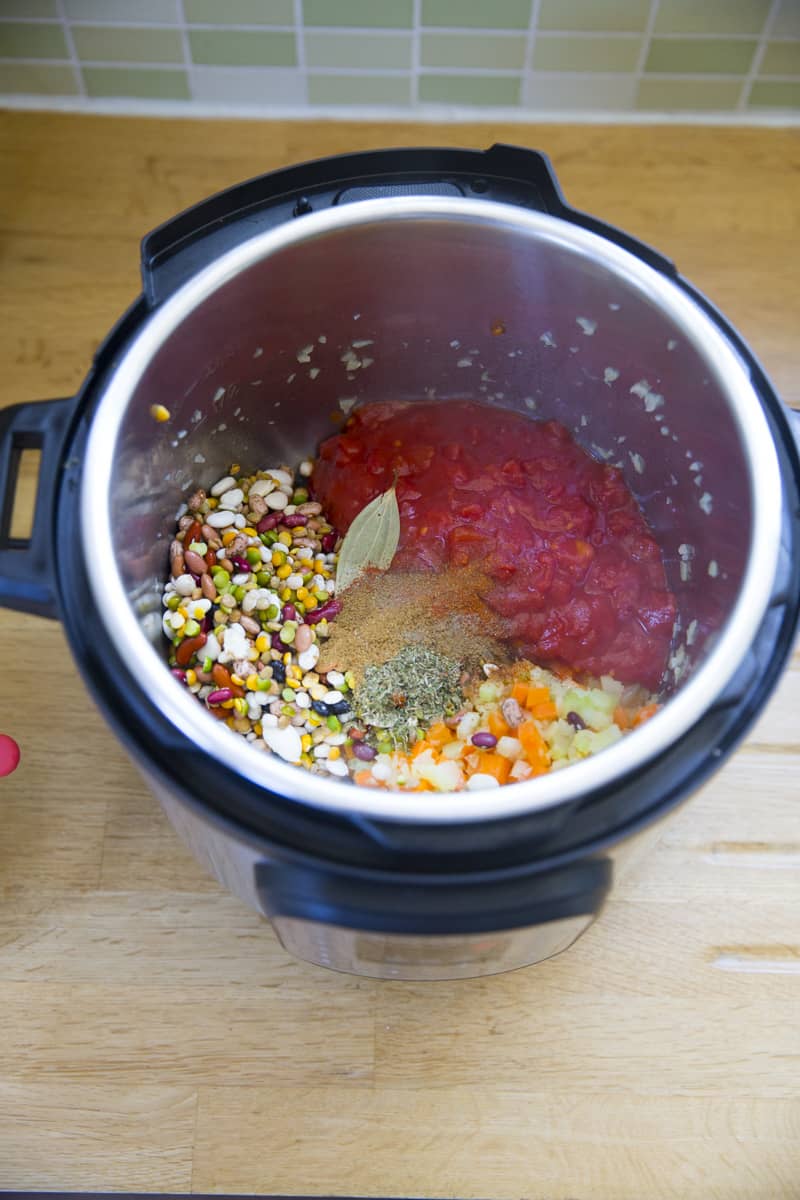 add the beans, tomato, spices in instant pot.