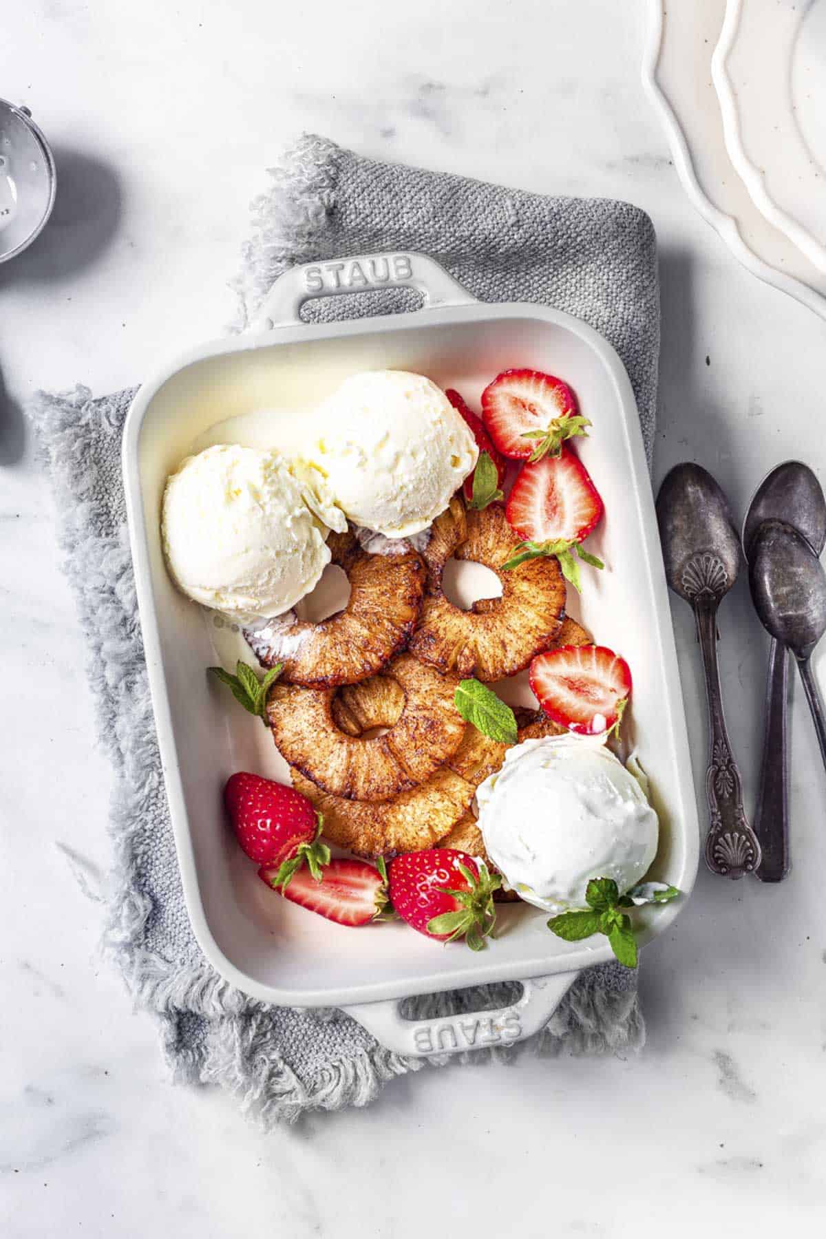 grilled warm air fryer pineapples with ice cream and strawberries