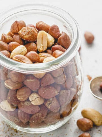 roasted peanuts in a small mason jar