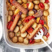 Sausage Potato baked in a white casserole dish.