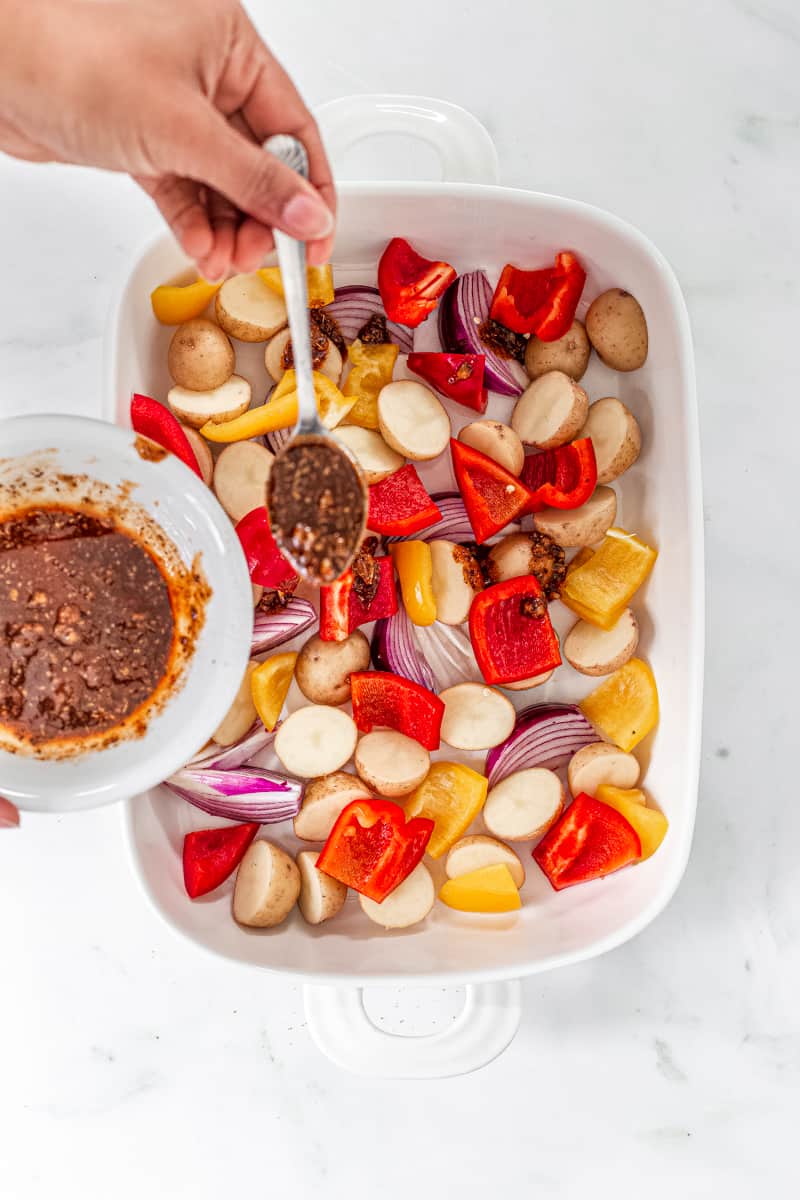 add spices to toss the potatoes and other veggies.