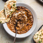 Homemade Black Dal served with naan