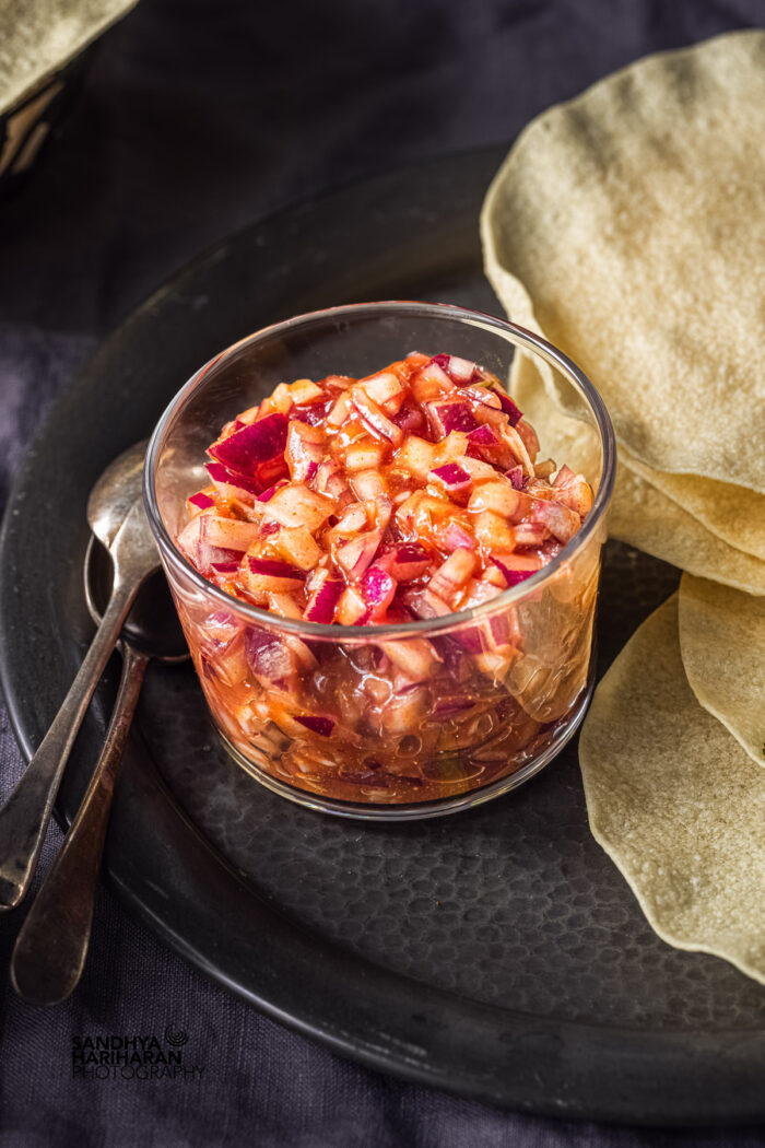 poppadoms served with Indian red onion chutney