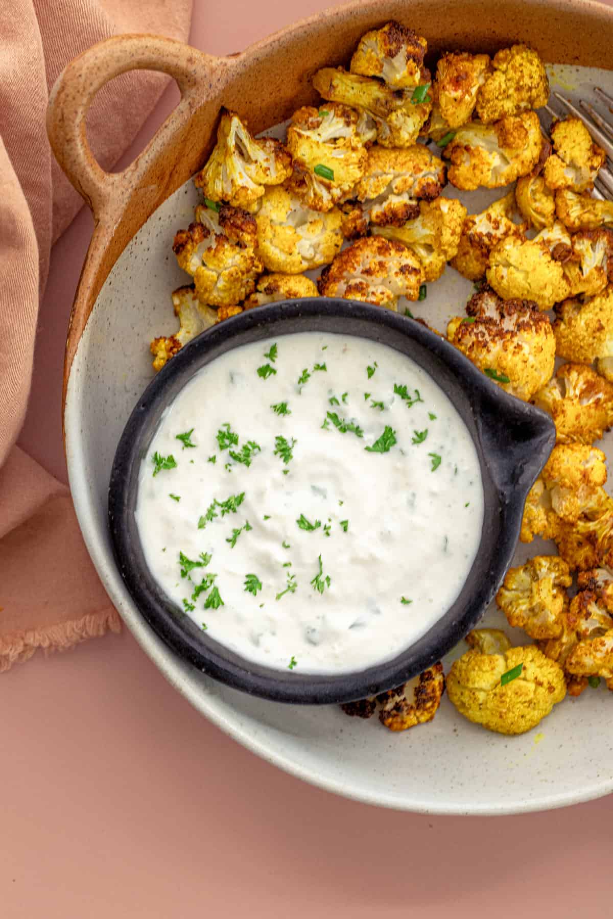 homemade onion garlic dip served with crispy cauliflower