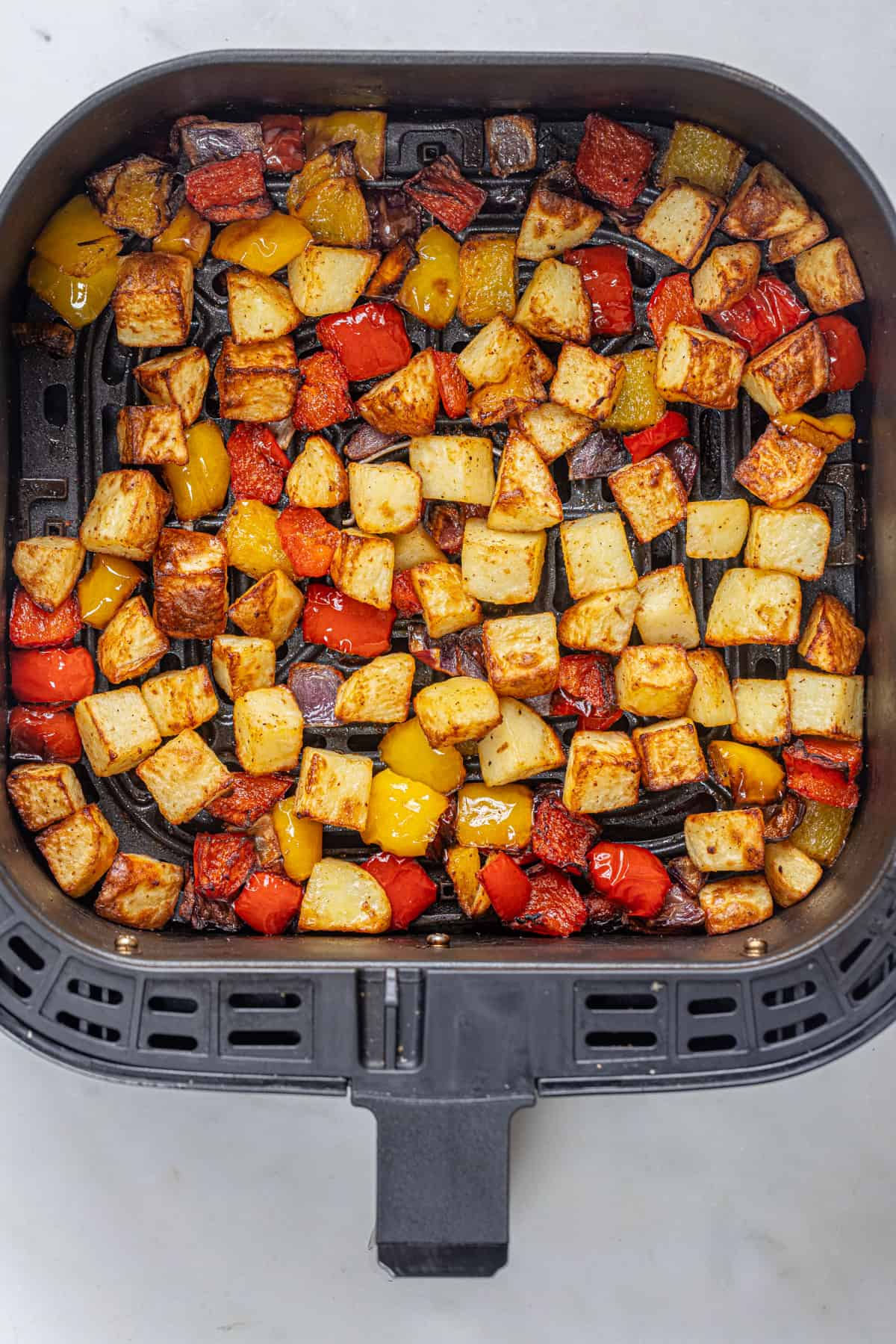 air fried potatoes, peppers and onions