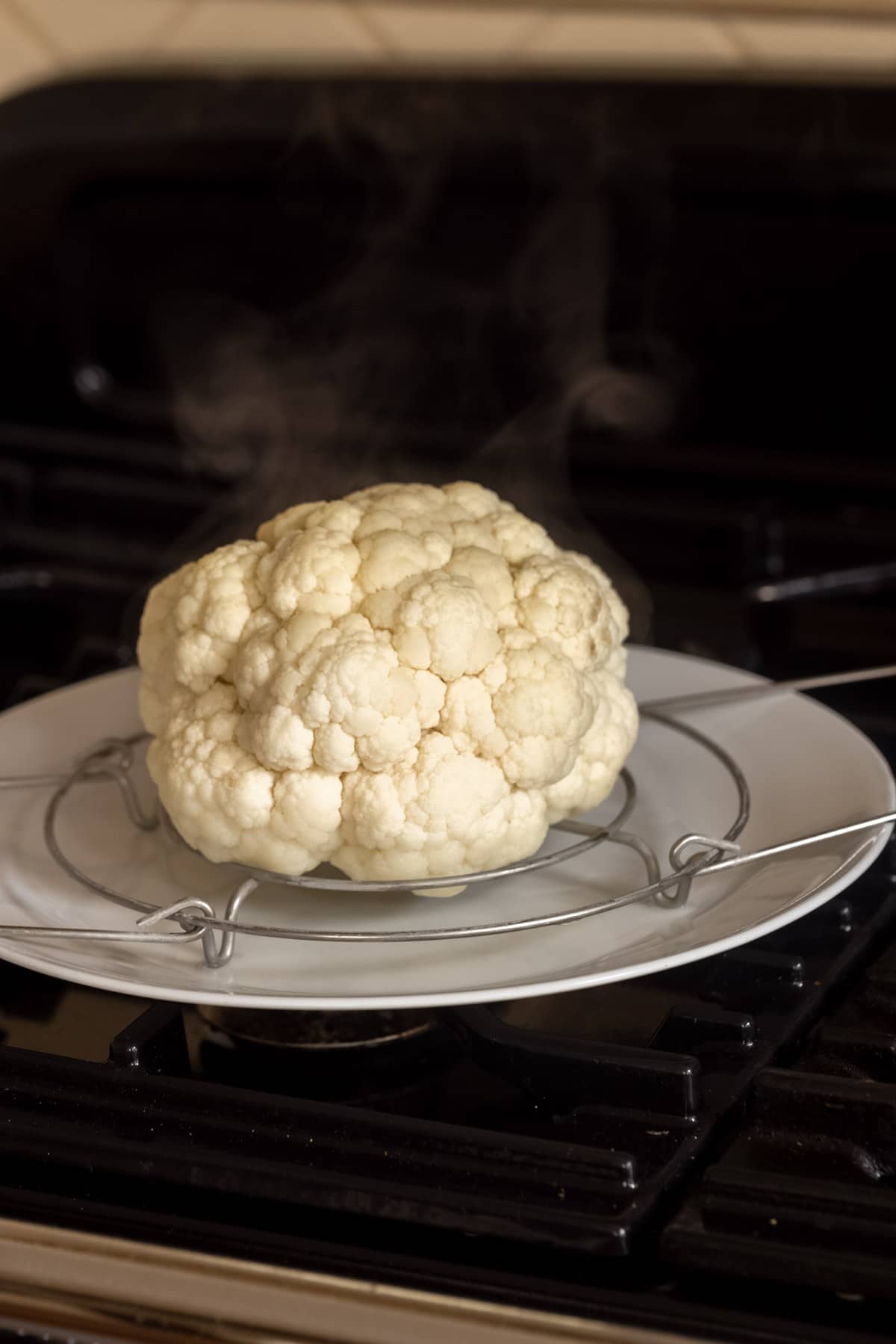 steamed cauliflower on a plate.