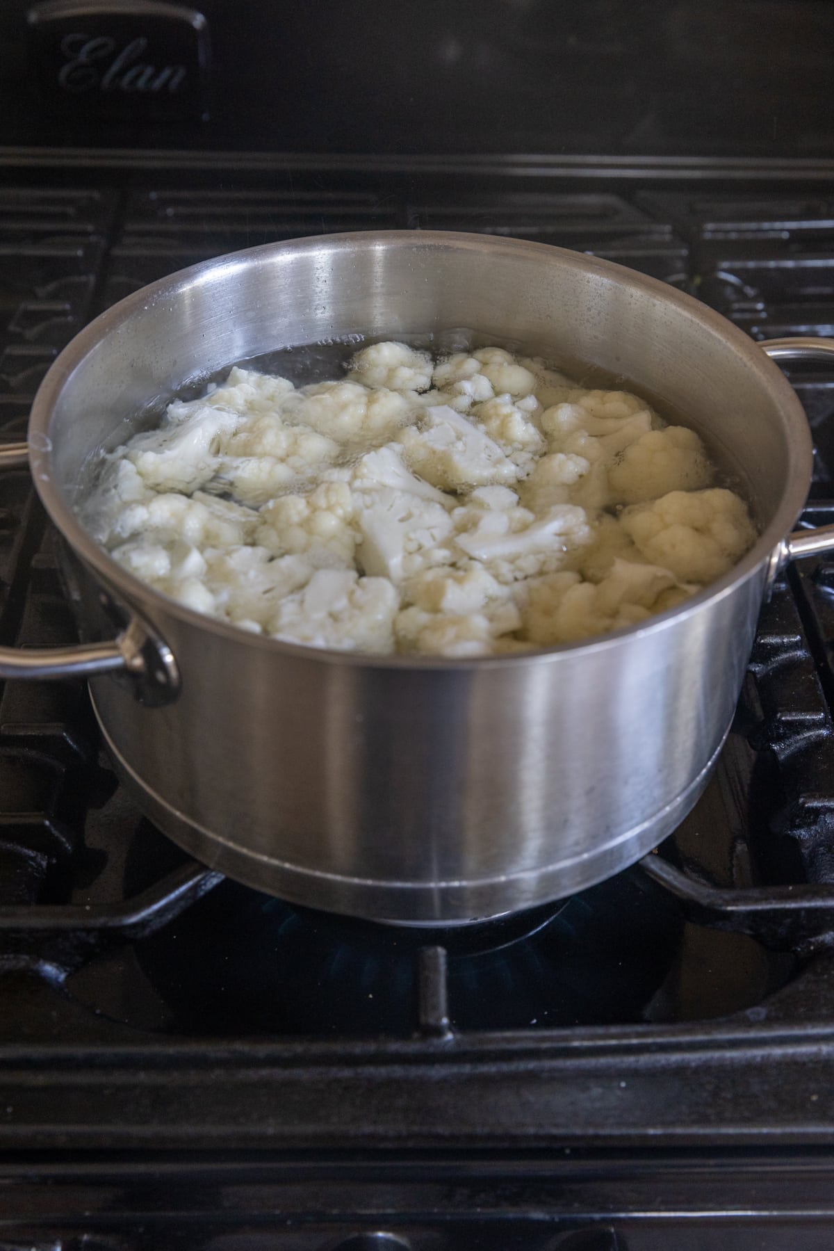 cook the cauliflower in a saucepan.