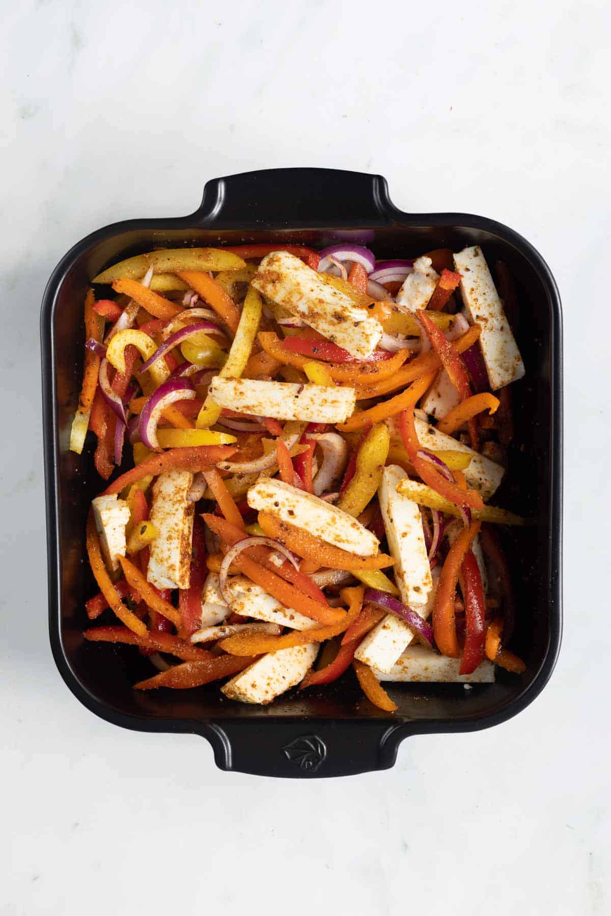 mix the veggies with fajita seasoning