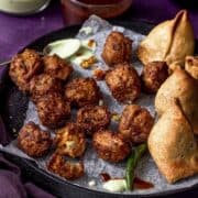air fryer frozen onion bhaji served with yogurt mint sauce