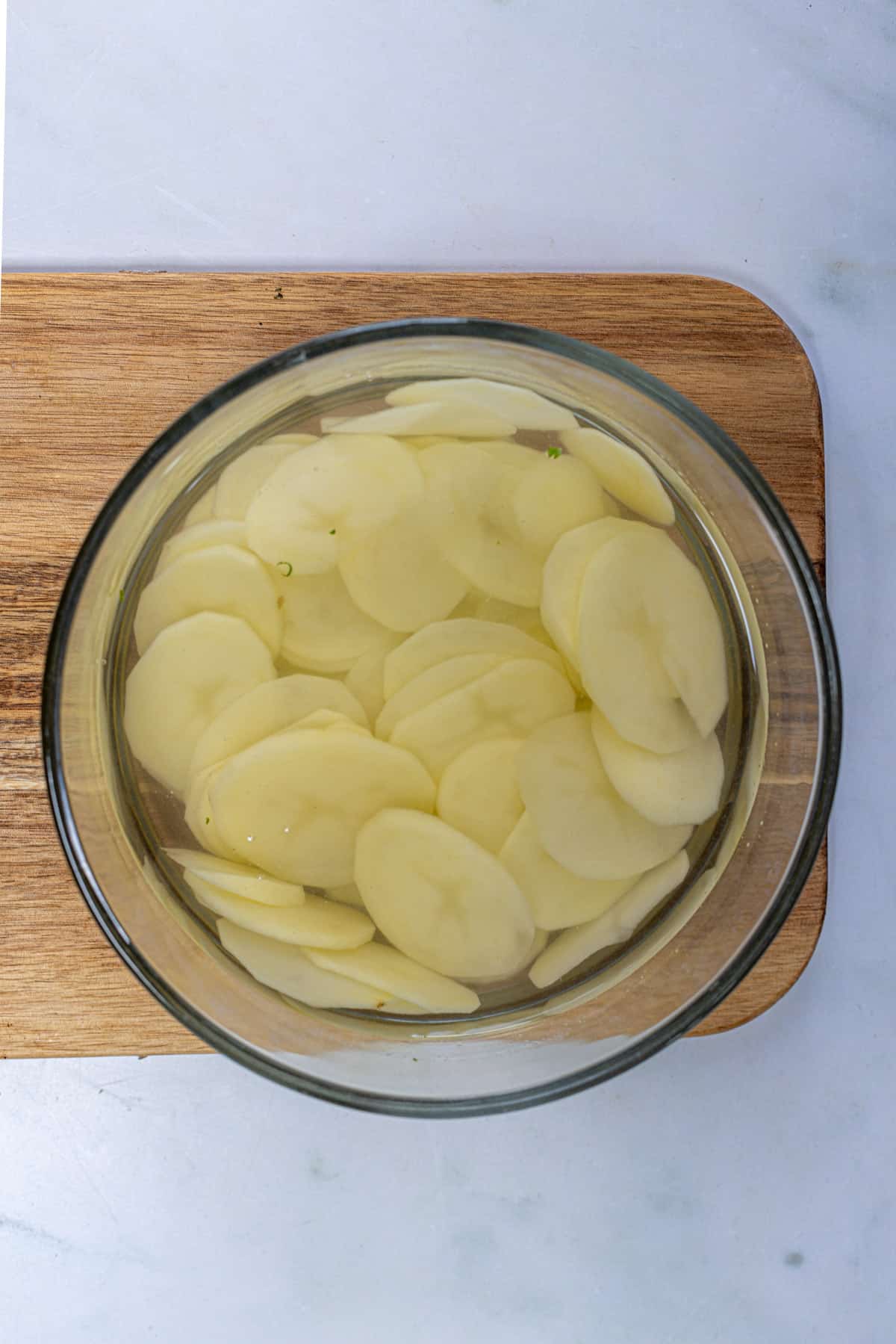 slice the potatoes and soak in water.
