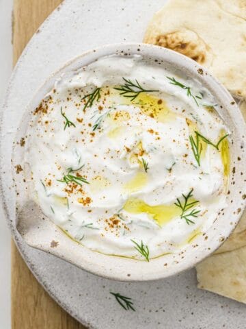 dill yogurt sauce served with pita bread