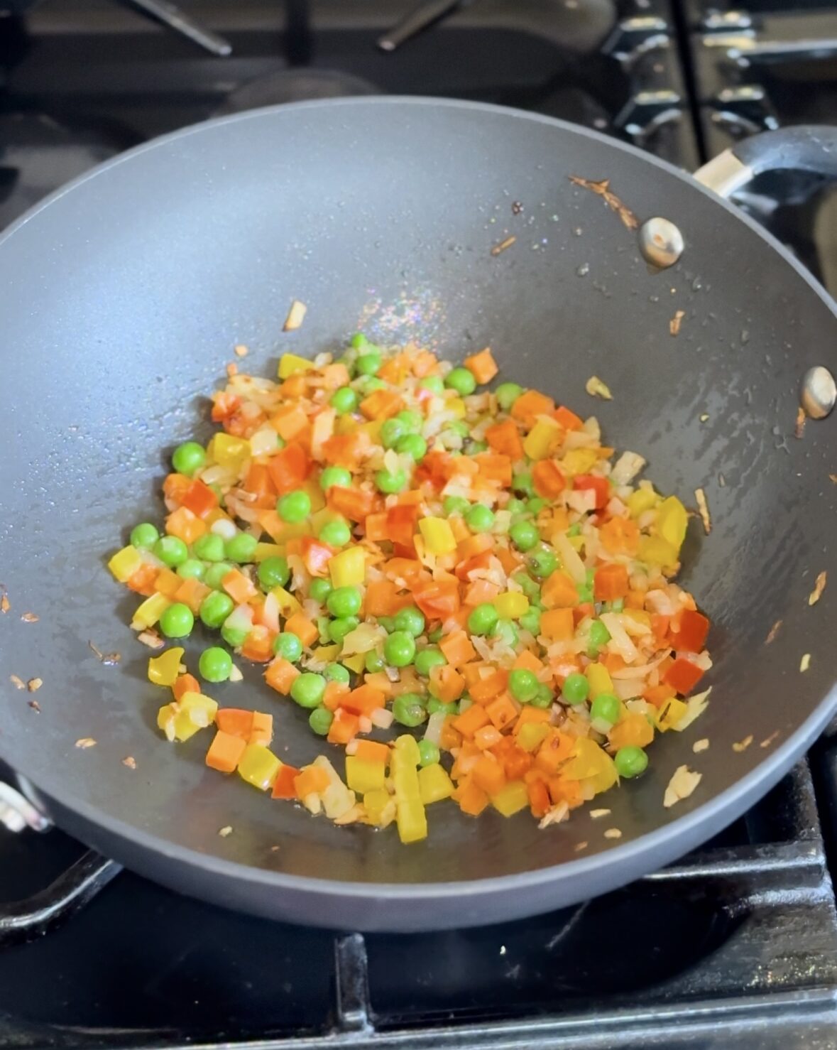 sauteeing veggies for making tofu fried rice.