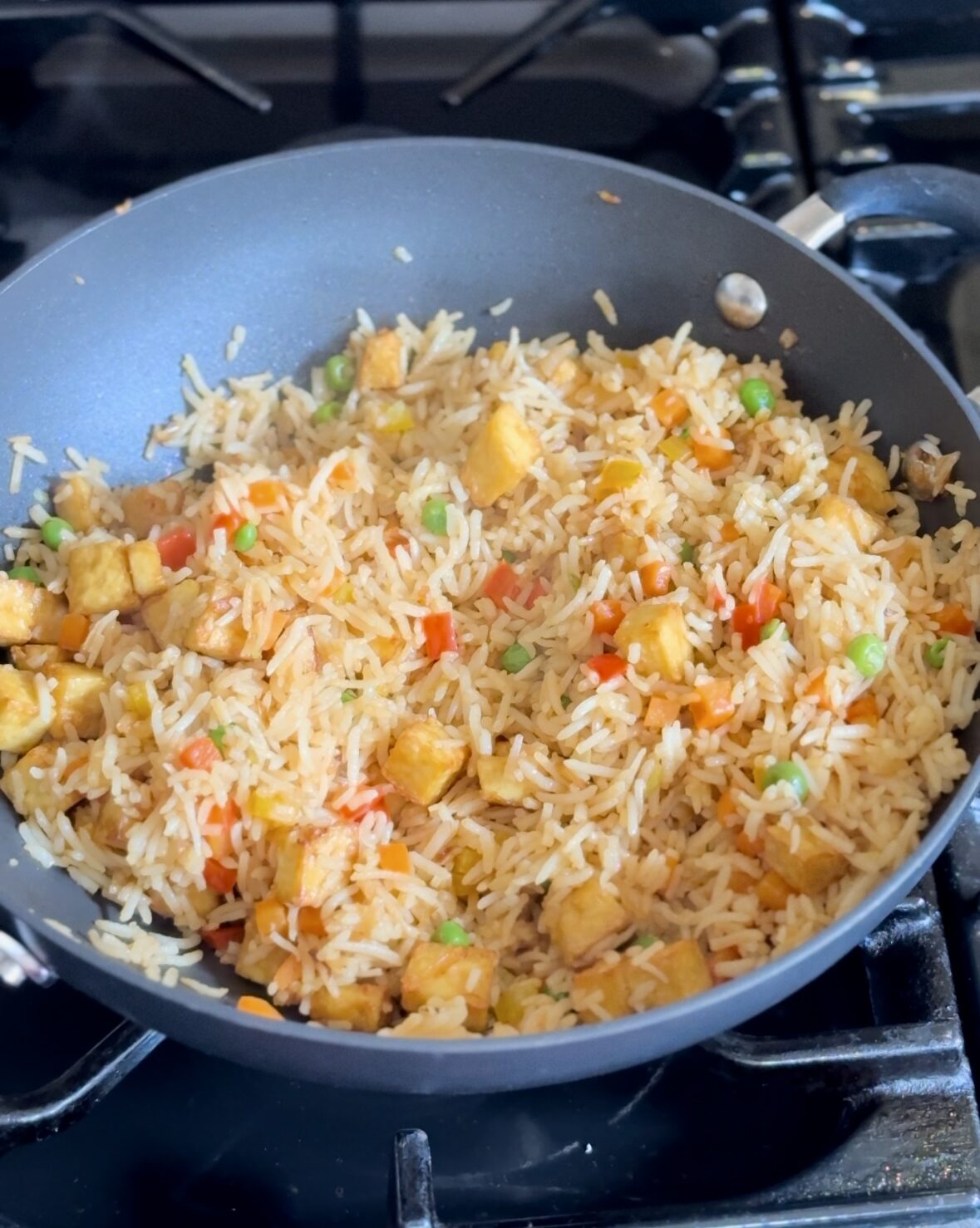 tofu fried rice served in a wok.