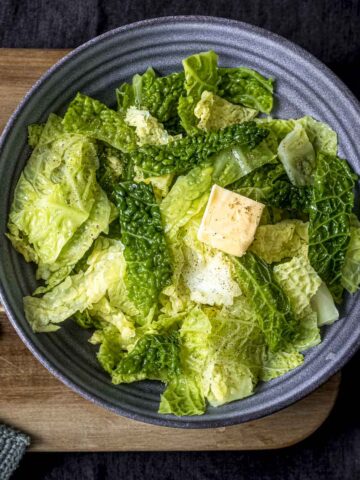 buttered savoy cabbage served in a bowl
