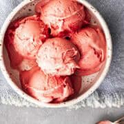 Ninja Creami Strawberry Ice cream scoops in a white bowl.
