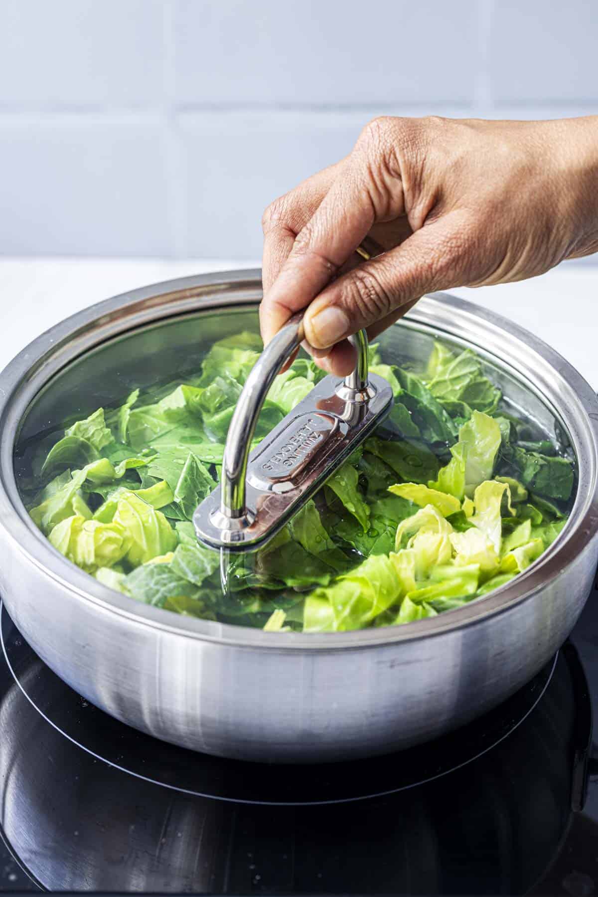 cook spring greens covered.