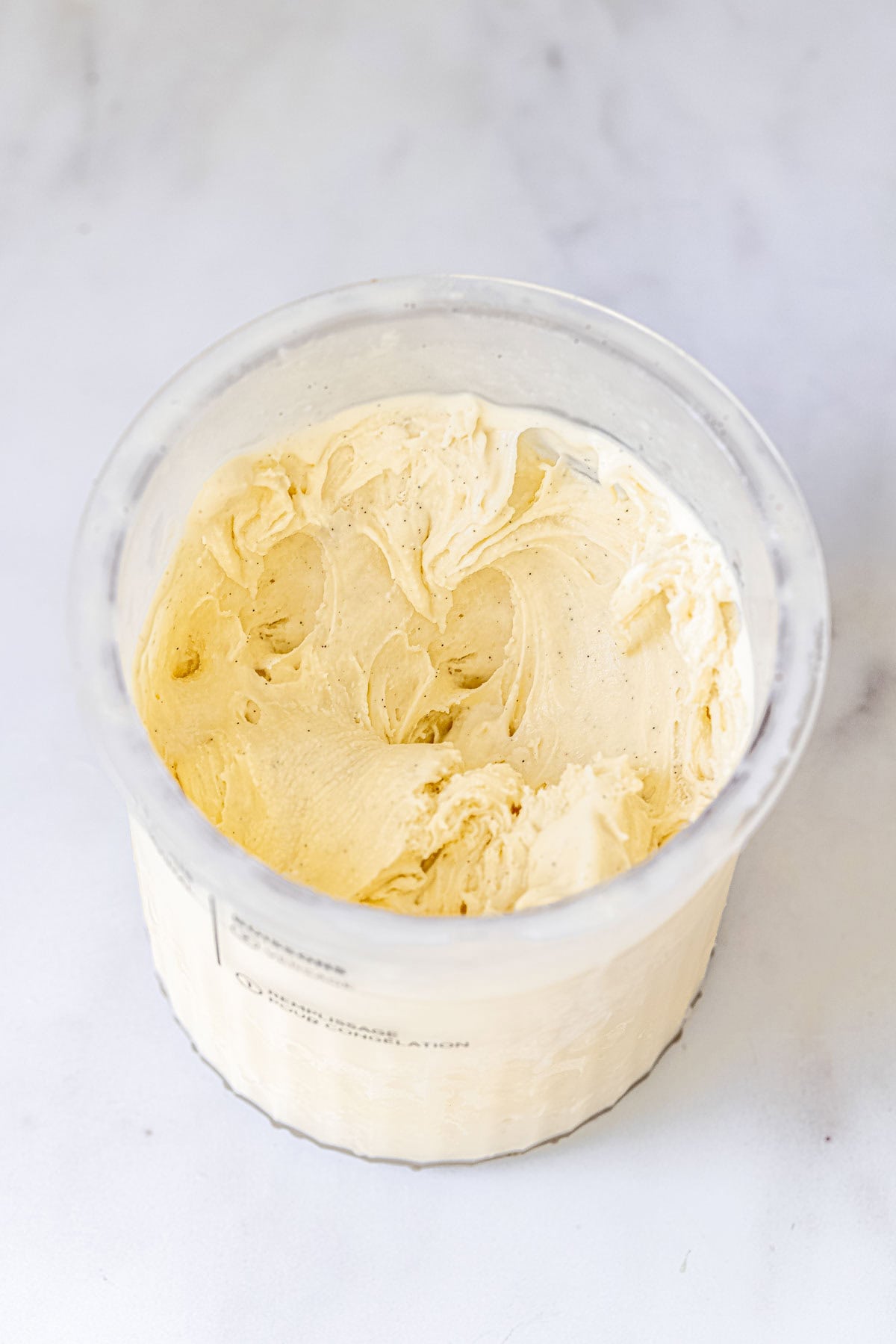 smooth creami vanilla ice cream in ninja creami tub.