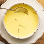 saffron cream sauce in a white bowl.
