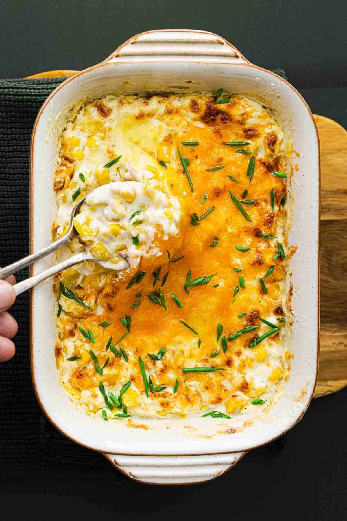 baked christmas corn in a  small rectangle dish.