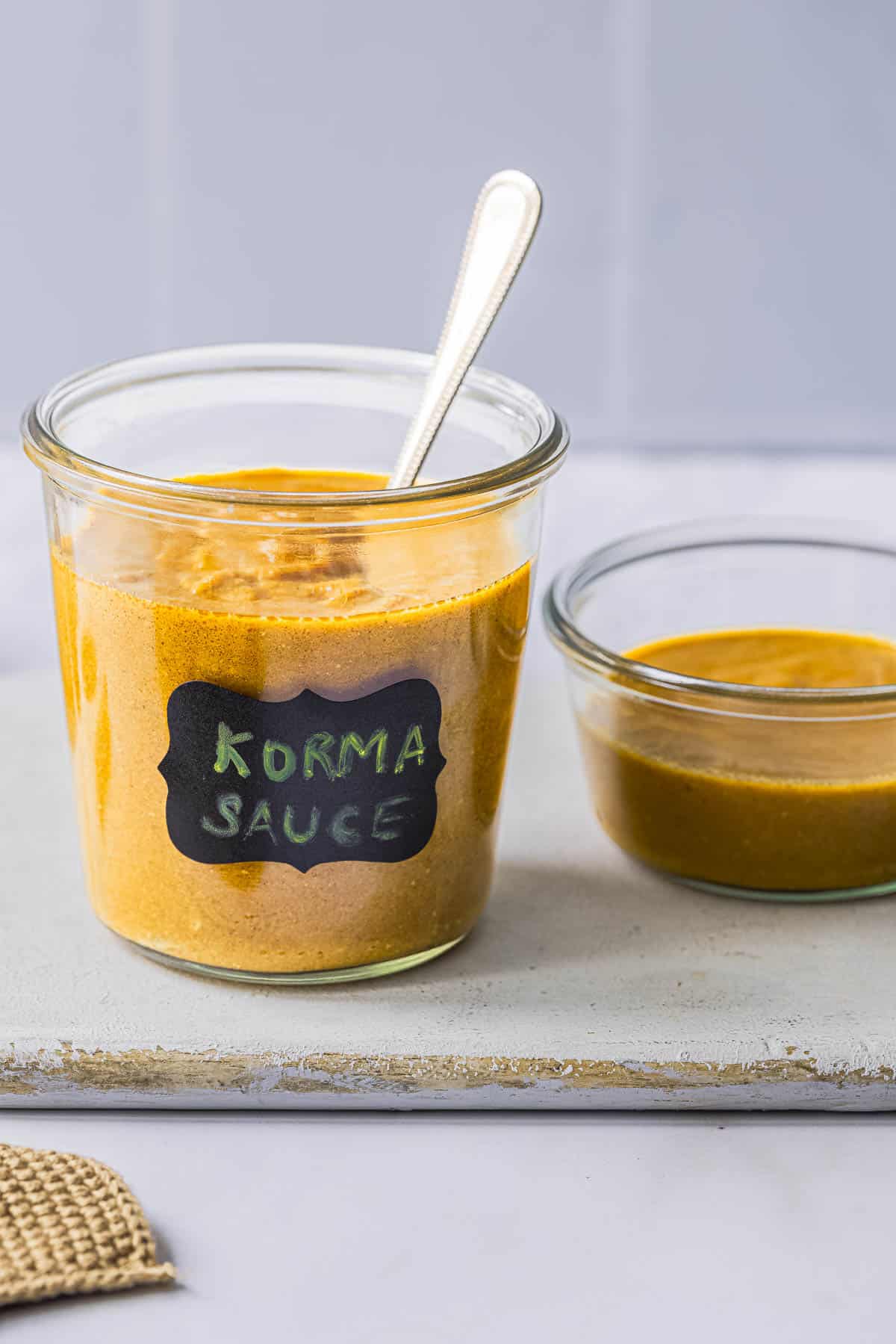 two jars of homemade korma sauce.