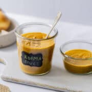 two jars of homemade korma cooking sauce.