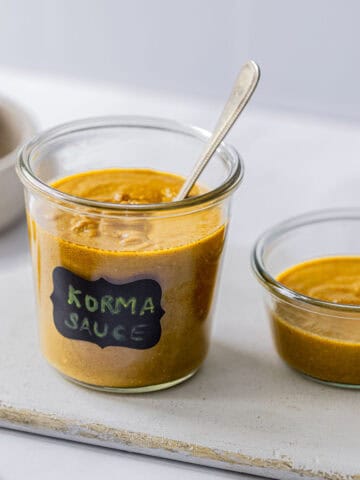 two jars of homemade korma cooking sauce.