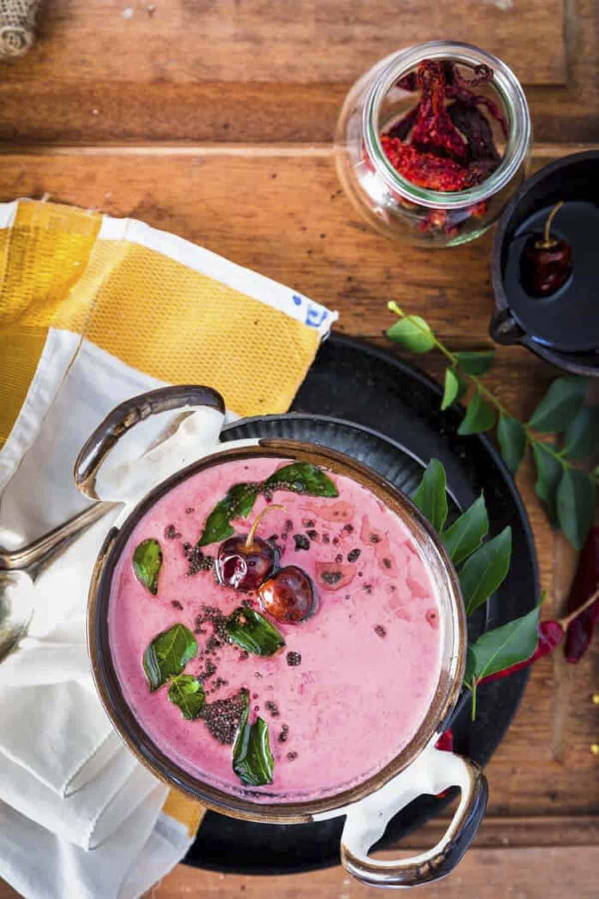 beetroot pachadi served in a kadhai bowl.