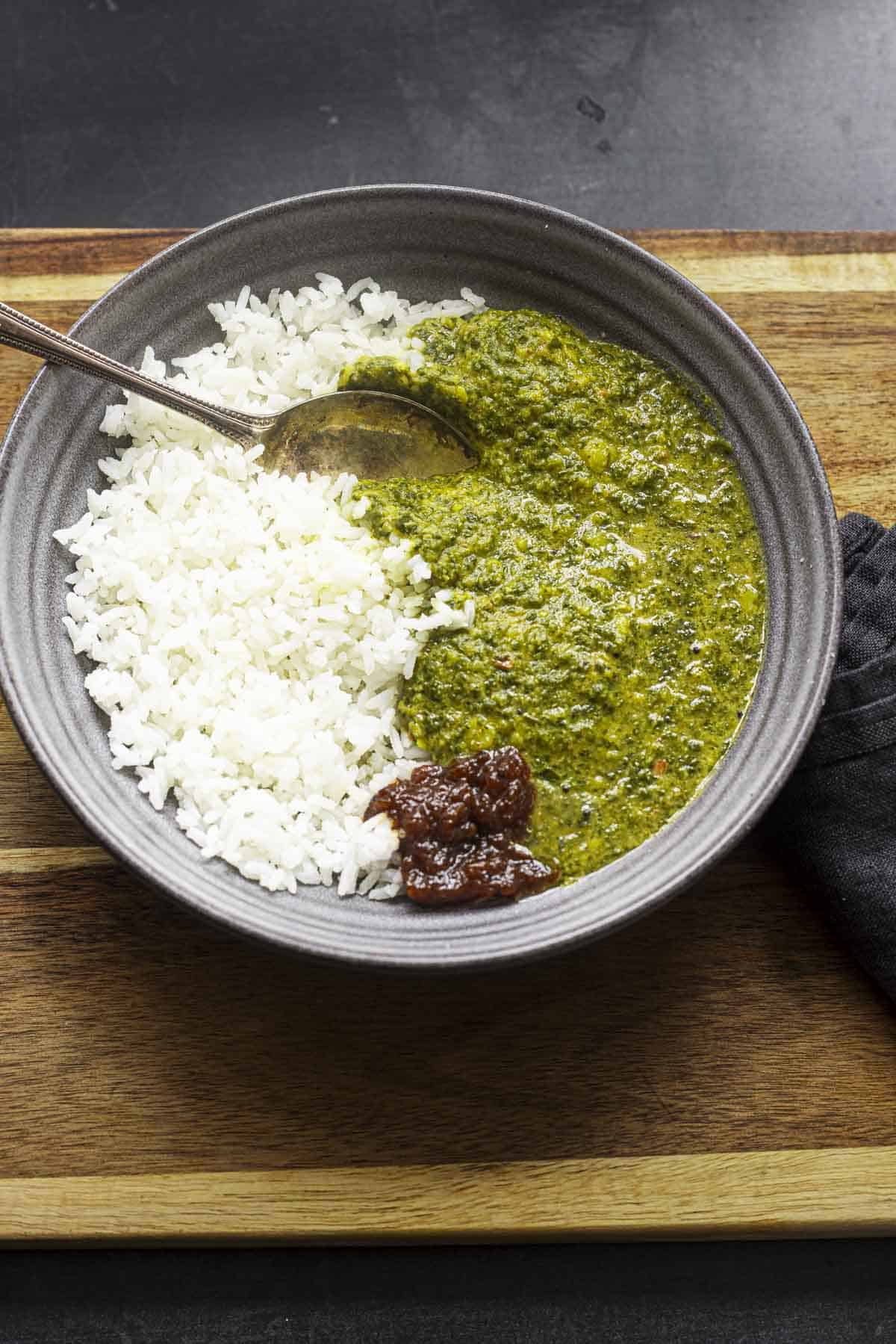 serving keerai molagootal with rice and thokku.