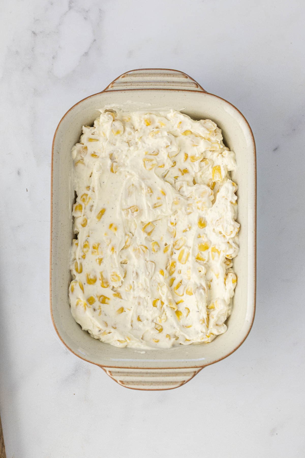 spoon the creamed corn in an oven proof baking dish.