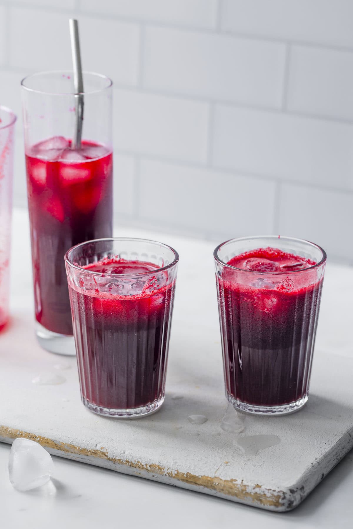 Three cups of fresh beetroot apple ginger juice.