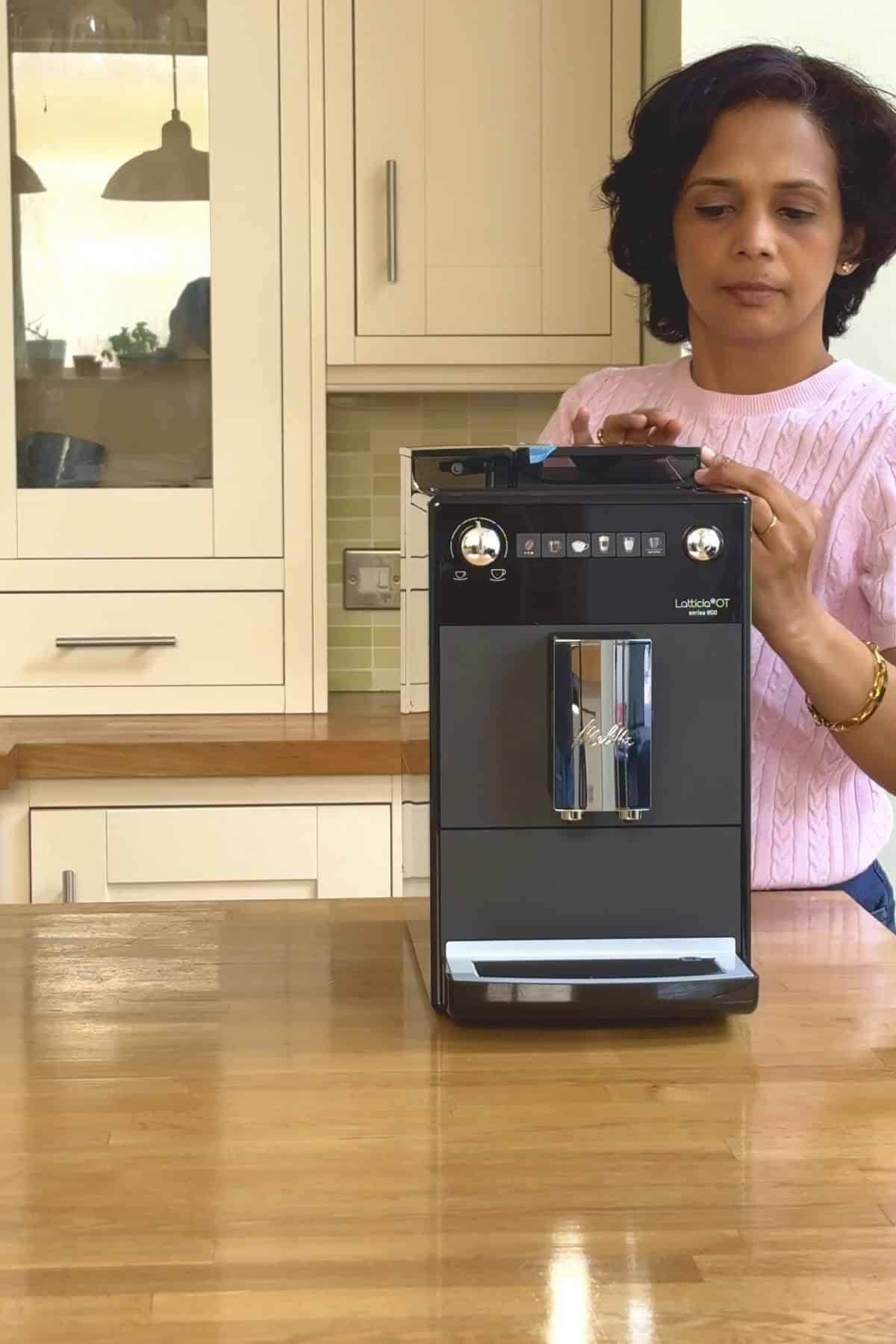 Sandhya with her new Melitta Bean-to-Cup Machine.