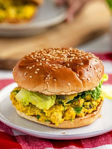 coronation chickpea filling in between burger buns.