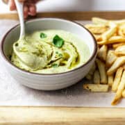 Homemade pesto mayonnaise served with fries.