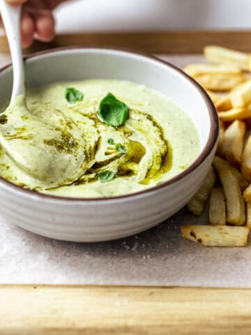 Homemade pesto mayonnaise served with fries.