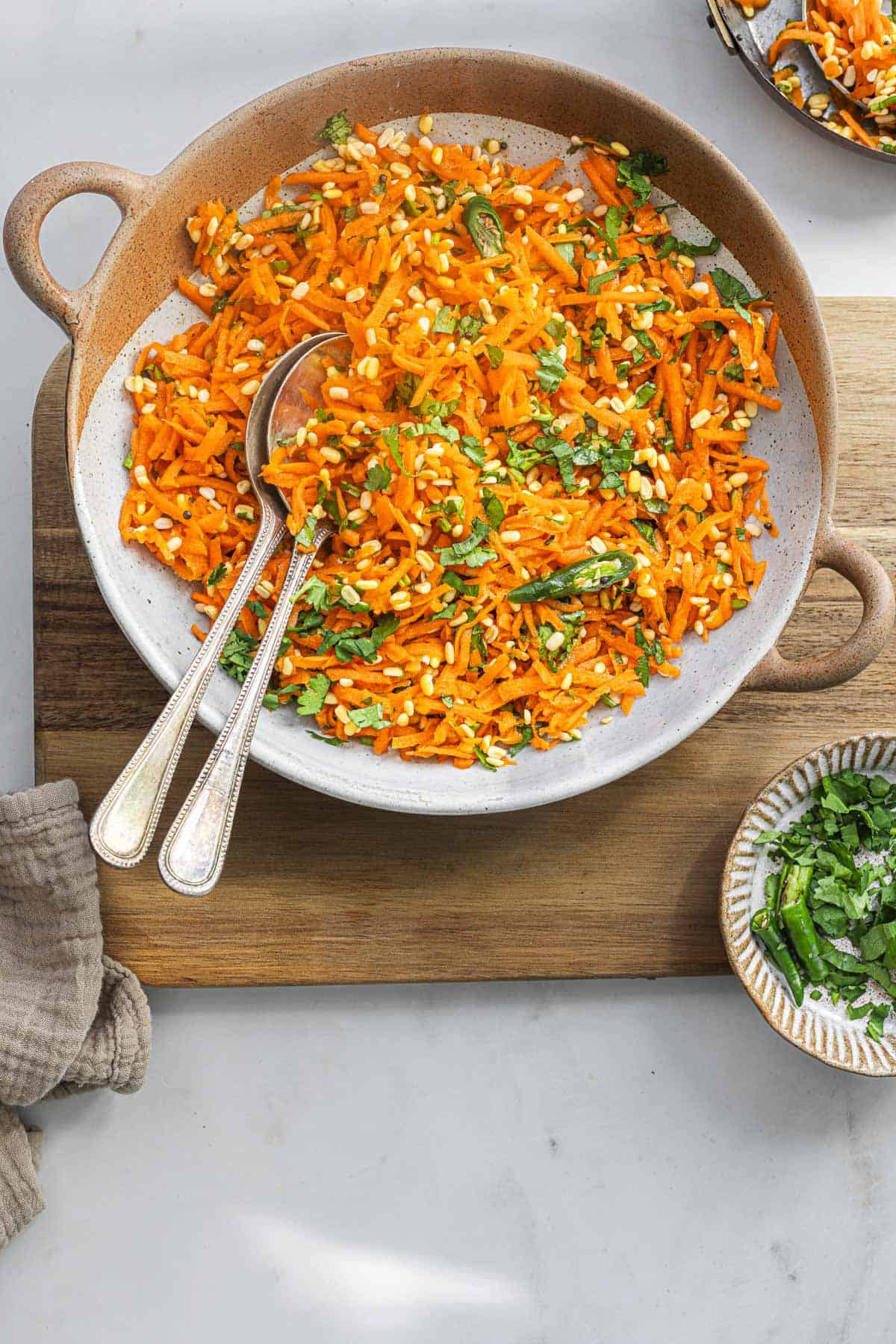a bowl of Indian moong dal carrot kosambari salad.