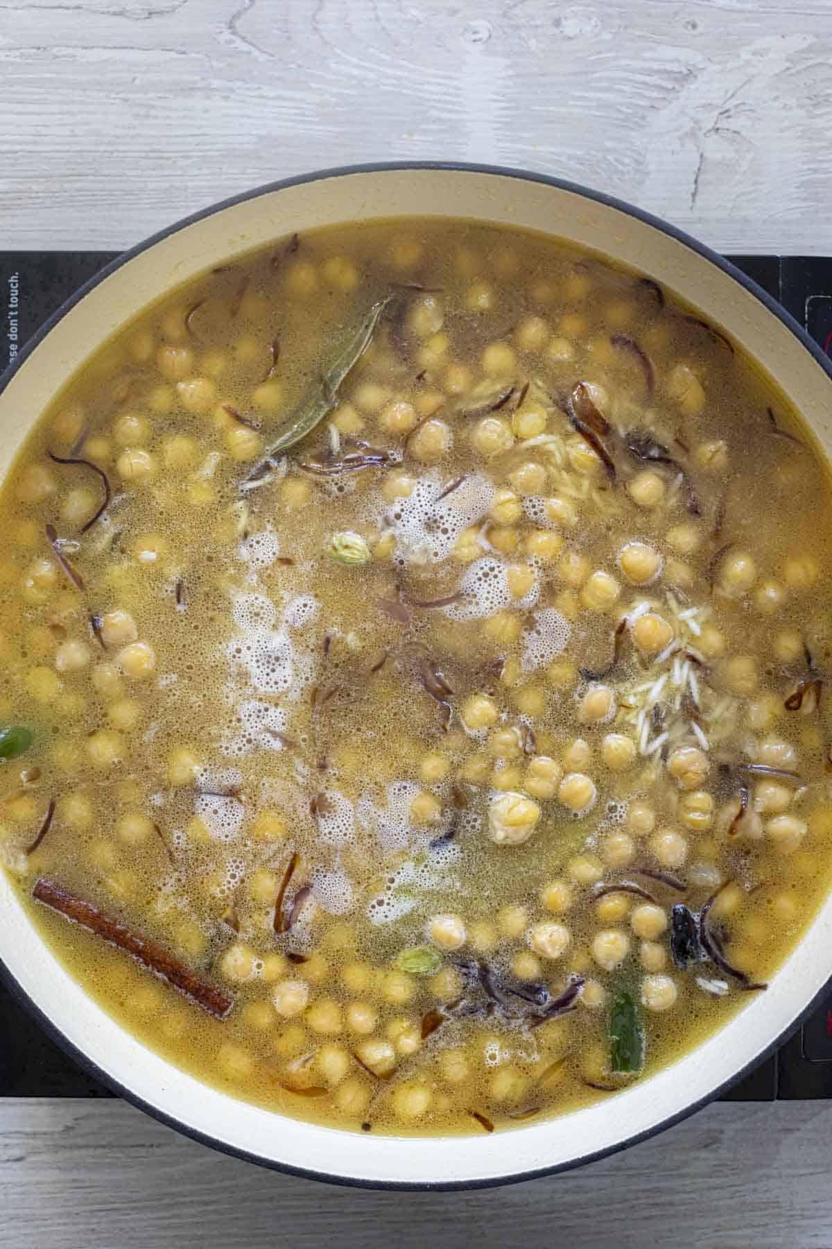 Add water to the pulao rice.
