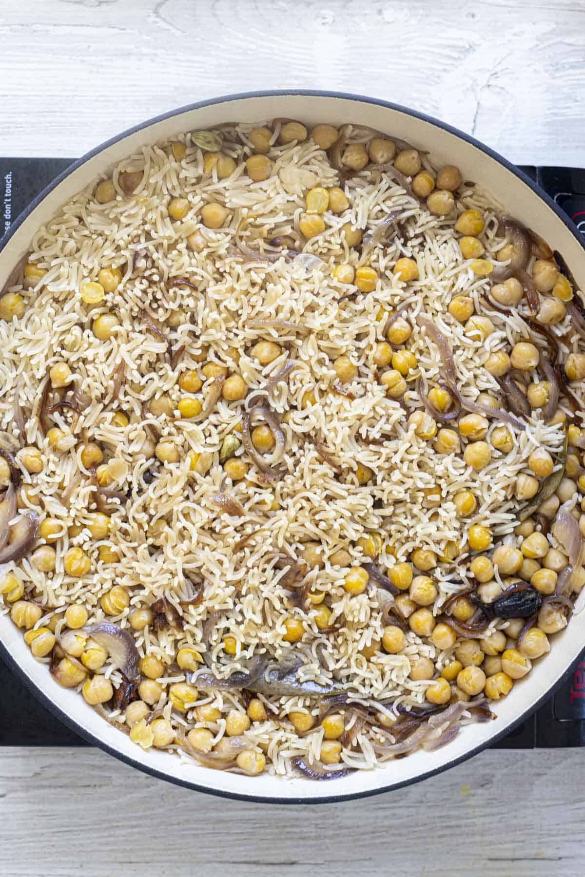 fluffy pulao rice in deep pan.