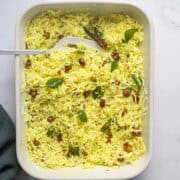 south Indian lemon rice in a rectangle dish.