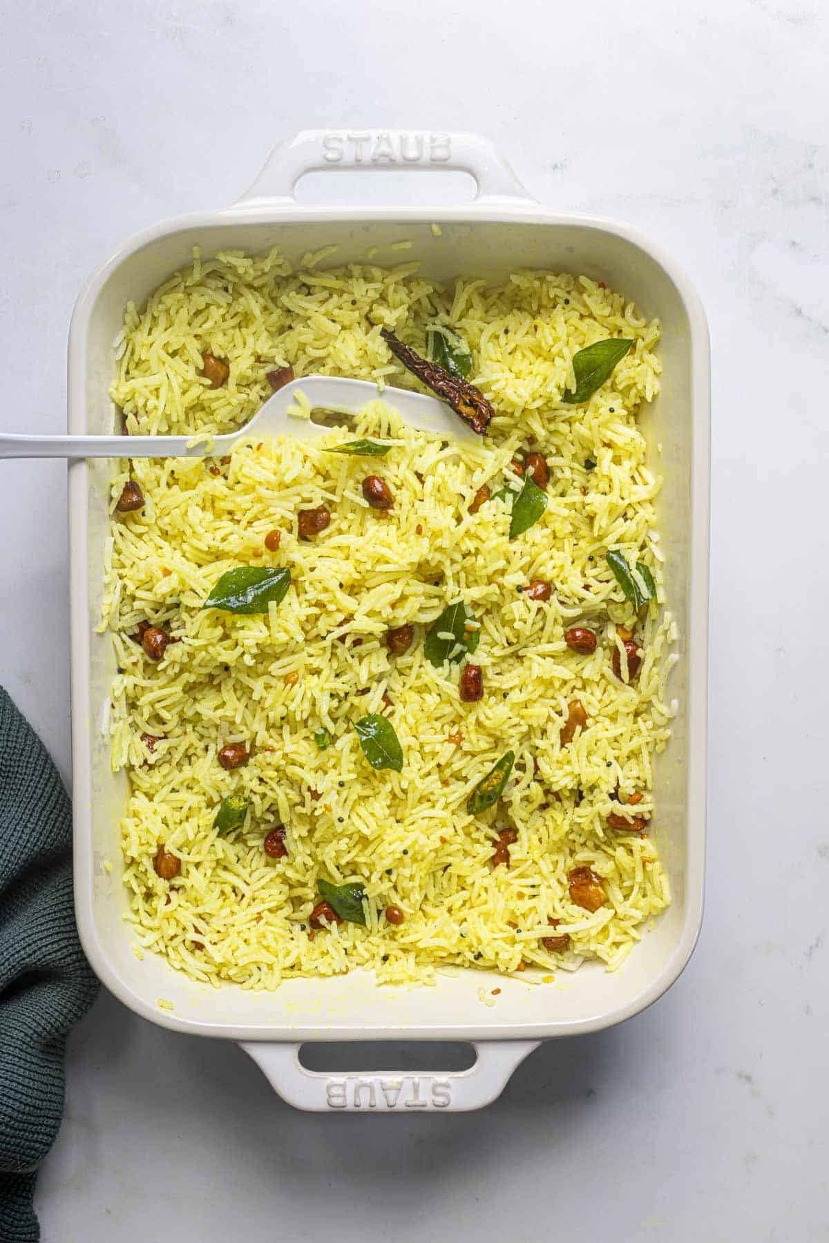 white dish with easy south indian lemon rice.